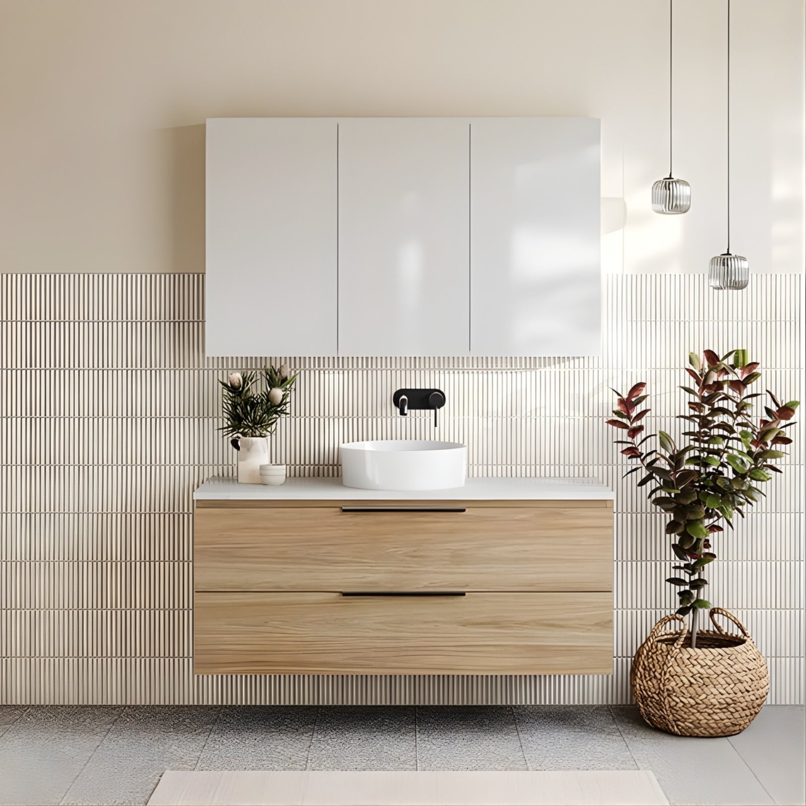 Timberline Nevada Plus Wall Hung Vanity with Above Counter Basin, timberline tennessee shaving cabinet, telbix bobo lights, white kitkat tiles and island grey terrazzo grey tiles. Caroma Liano II tapware matte black