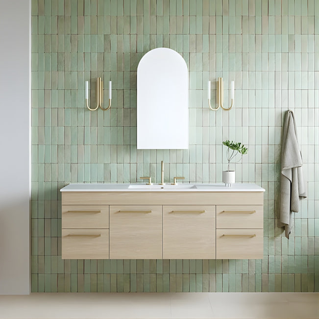 Timberline Indiana wall hung canity and Timberline church arch shaving cabinet with mirror in a beautiful aqua blue handmade tiled bathroom and Phoenix plus lever gold tapware and telbix joshua wall lights in gold. 