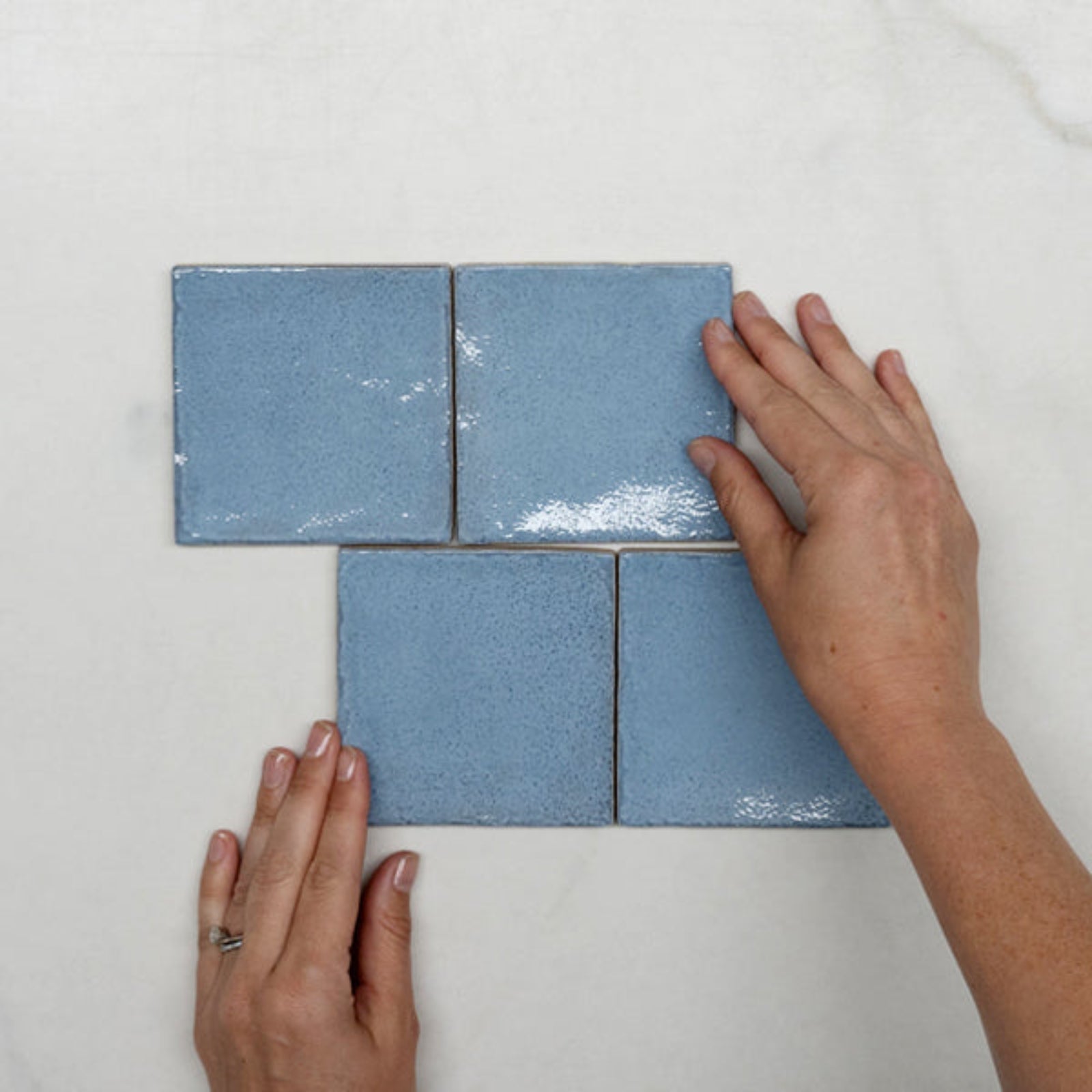 Pattern With Hand Ash Blue Dianna Zellige Tile 100 x 100 x 9mm Spanish Ceramic  - The Blue Space