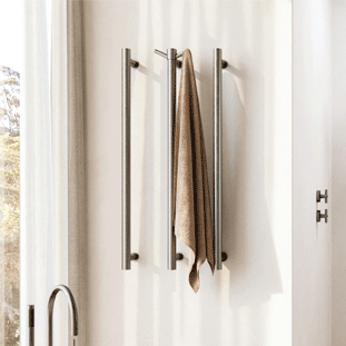 Three heated single vertical towel rails in luxury bathroom. Shop vertical heated towel rails, heated towel ladders and underfloor heating at The Blue Space