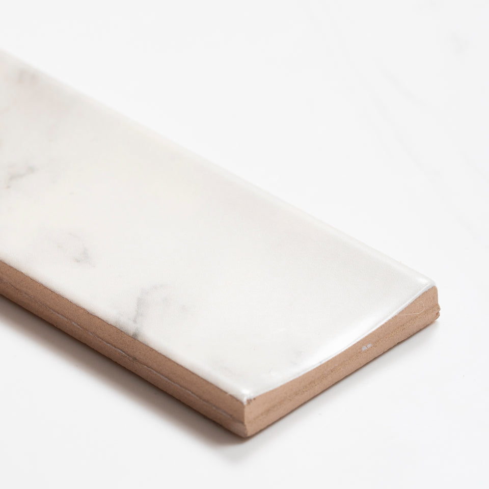 Matrix White Marble Look Satin Porcelain Concave Subway Tile 50mm x 300mm